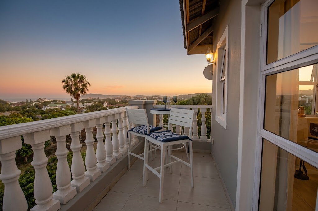 Presidential Suite balcony overlooking Plettenberg Bay at sunset