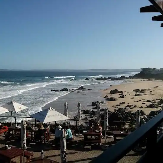 Ristorante Enrico terrace overlooking Keurboomstrand beach and the ocean